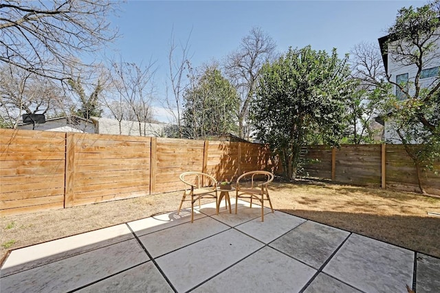 view of patio with a fenced backyard