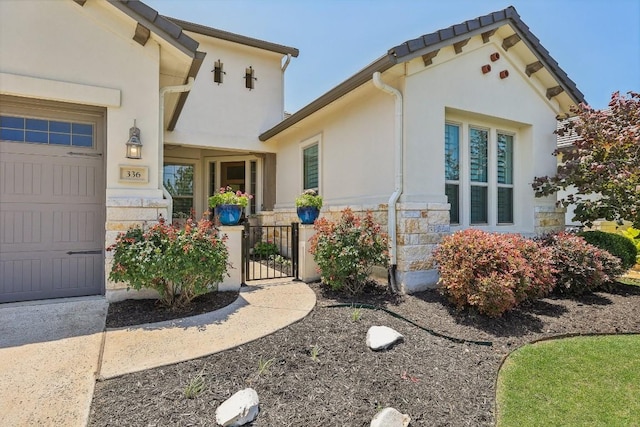 entrance to property featuring a garage