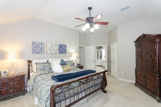 bedroom with ceiling fan, light colored carpet, and lofted ceiling