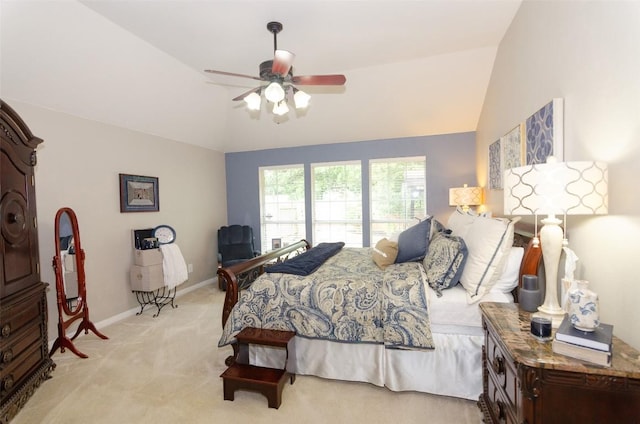 carpeted bedroom with lofted ceiling and ceiling fan