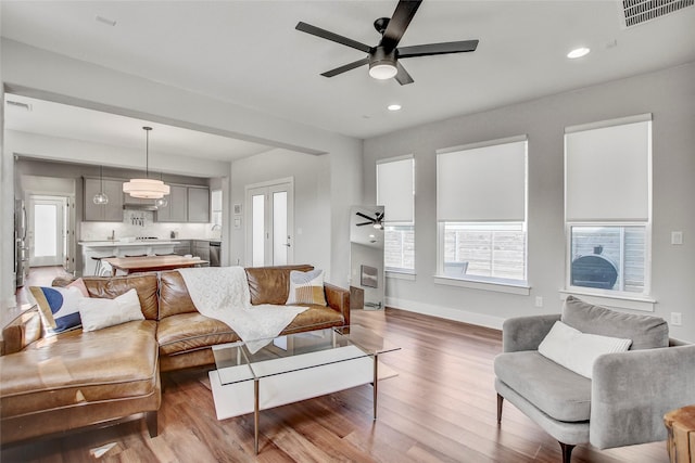 living room with light hardwood / wood-style floors