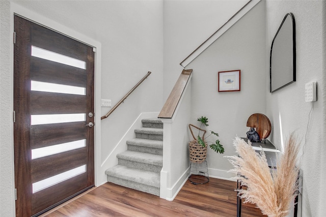 foyer entrance featuring hardwood / wood-style flooring