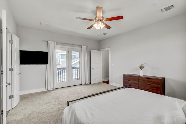 bedroom featuring access to exterior, ceiling fan, and light colored carpet