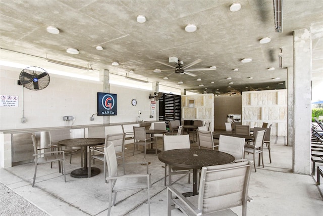 dining room featuring ceiling fan