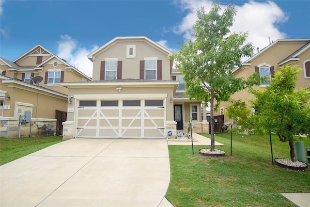 view of front of property featuring a front yard and a garage