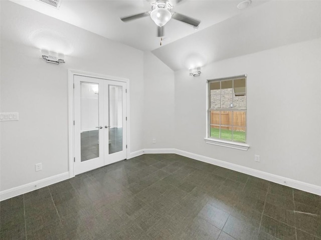 spare room with french doors, vaulted ceiling, and ceiling fan