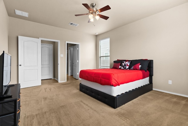 carpeted bedroom with ceiling fan