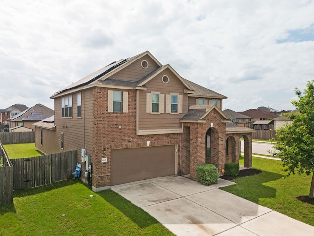 view of front facade featuring a garage and a front yard