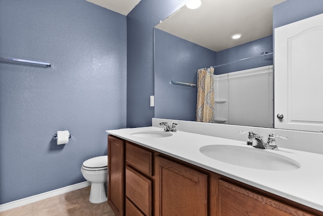 bathroom featuring vanity, a shower with shower curtain, tile patterned flooring, and toilet