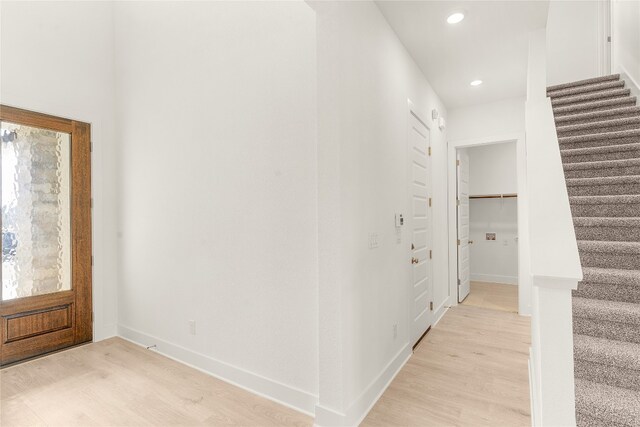 foyer with light hardwood / wood-style flooring