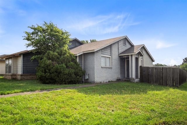 view of front of home with a front lawn