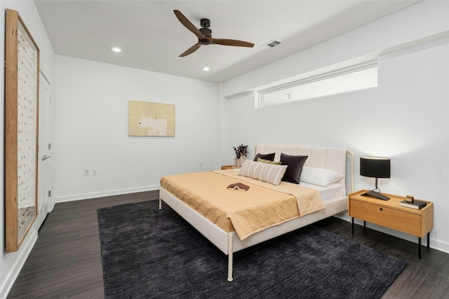 bedroom featuring dark wood-type flooring and ceiling fan