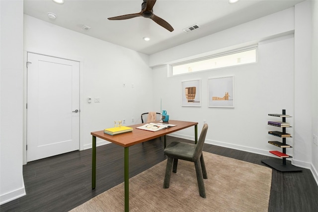 office space with dark wood-type flooring and ceiling fan