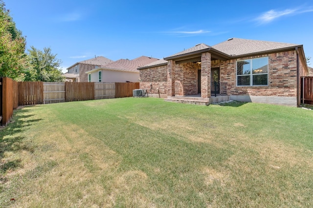 exterior space with a yard and a patio area