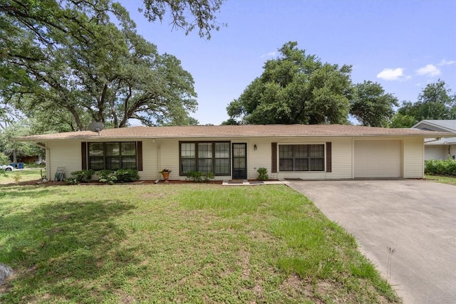 ranch-style home with a front yard