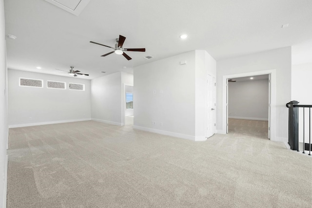 unfurnished room featuring light carpet and visible vents