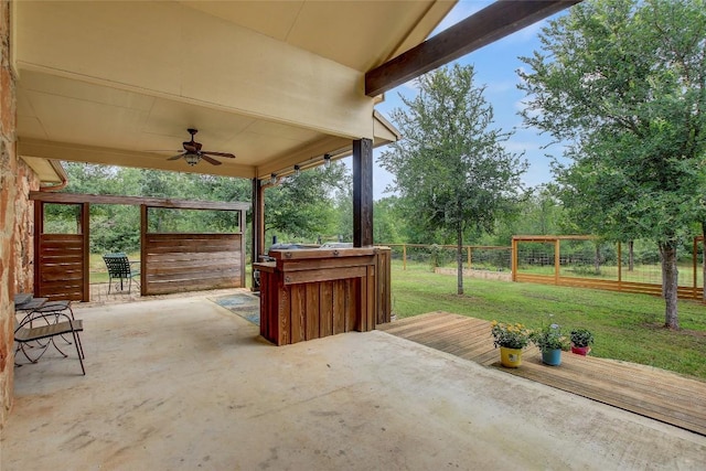 view of patio / terrace featuring ceiling fan