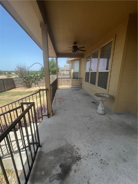 view of patio featuring ceiling fan