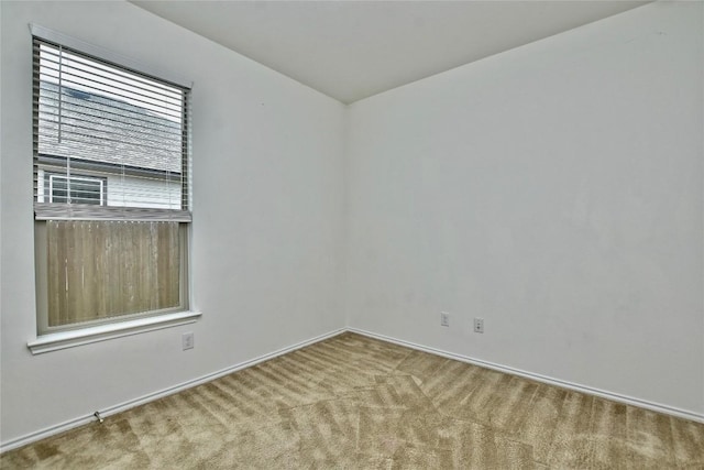 unfurnished room featuring carpet floors