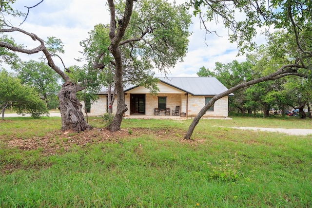 single story home with a patio