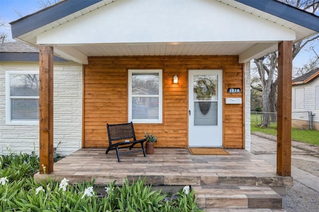 doorway to property with covered porch