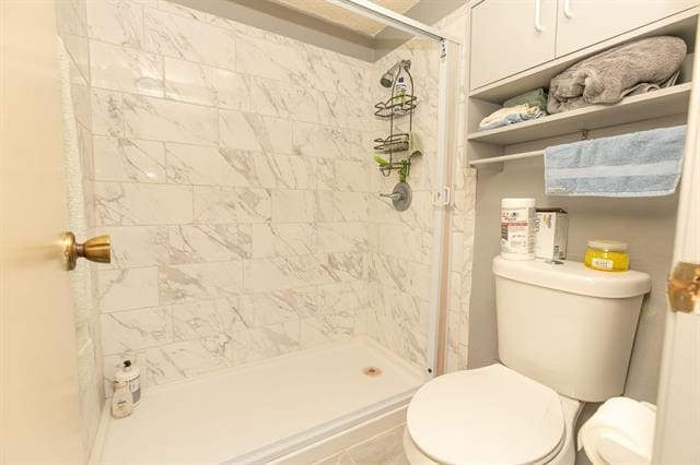 306 Out Yonder Unit 166, Horseshoe Bay, TX 78657 - full bathroom featuring toilet and a stall shower