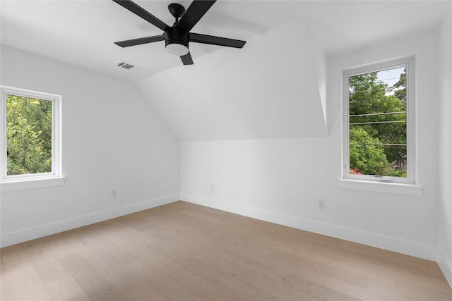 bonus room featuring vaulted ceiling, ceiling fan, and light hardwood / wood-style flooring