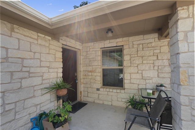 doorway to property featuring a patio