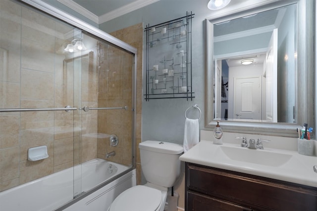 full bathroom with toilet, vanity, ornamental molding, and shower / bath combination with glass door