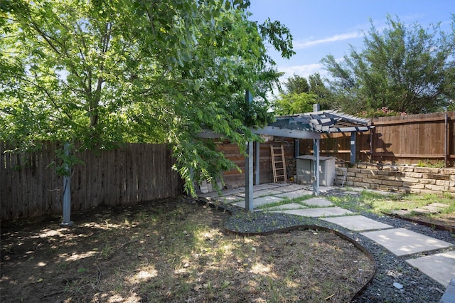 view of yard featuring a pergola and a patio area