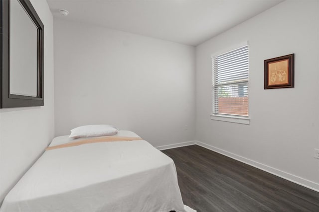 bedroom featuring dark hardwood / wood-style floors