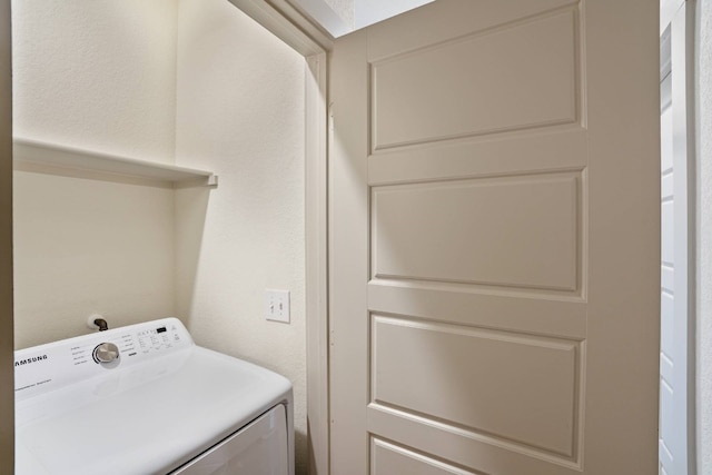 washroom featuring washer / clothes dryer