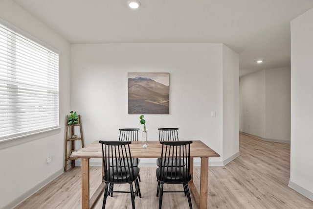 dining room with light hardwood / wood-style floors