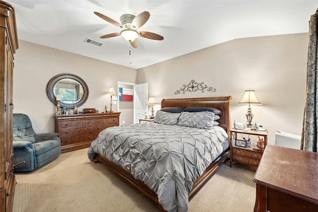 carpeted bedroom featuring ceiling fan and lofted ceiling