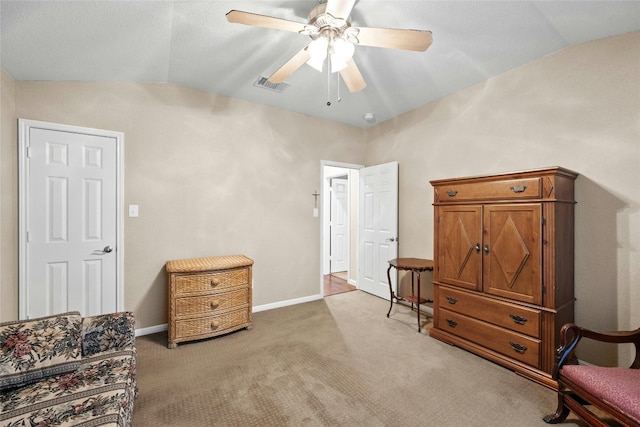 sitting room with carpet flooring, ceiling fan, and lofted ceiling