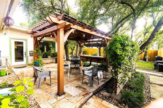 view of patio featuring a pergola