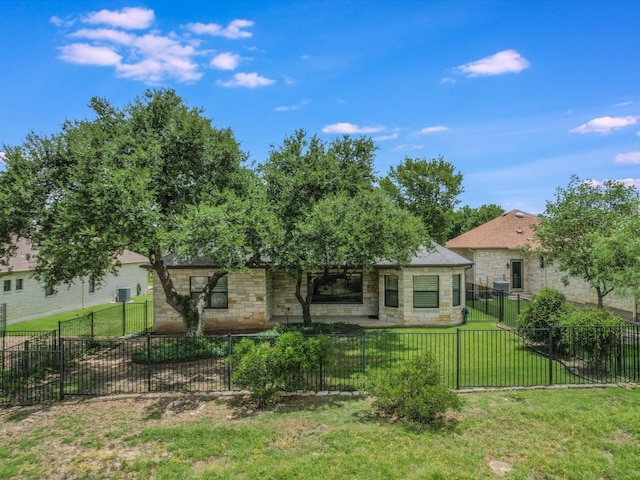 back of property featuring a lawn