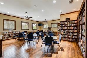 dining room featuring ornamental molding, a ceiling fan, wood finished floors, and recessed lighting