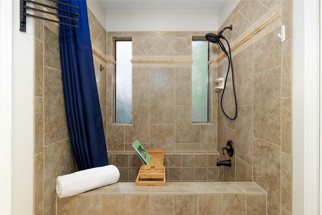 full bathroom with a tile shower