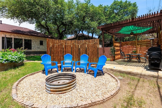 view of yard featuring a patio, fence, and a pergola