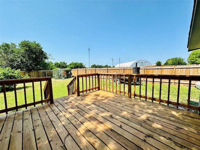 deck featuring a yard