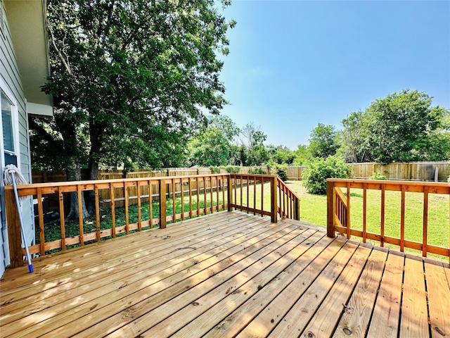 deck featuring a yard