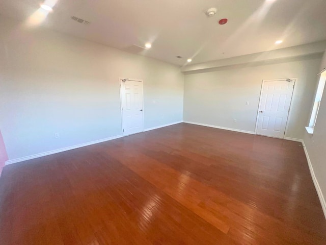 empty room with wood-type flooring