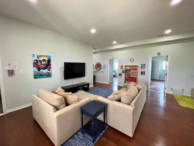 living room featuring dark hardwood / wood-style floors