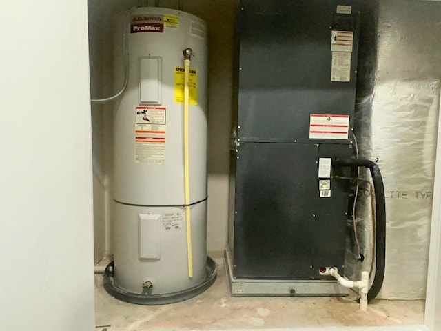 utility room with heating utilities and water heater