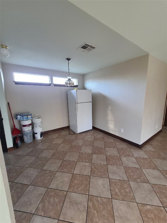 washroom featuring tile flooring