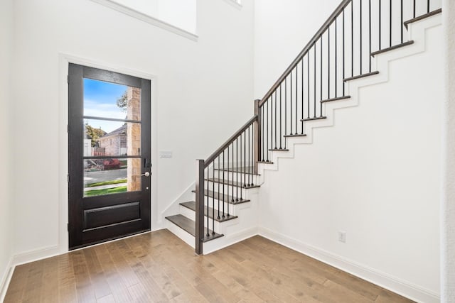 entryway with wood-type flooring