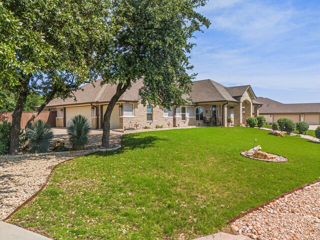 ranch-style home with a front lawn