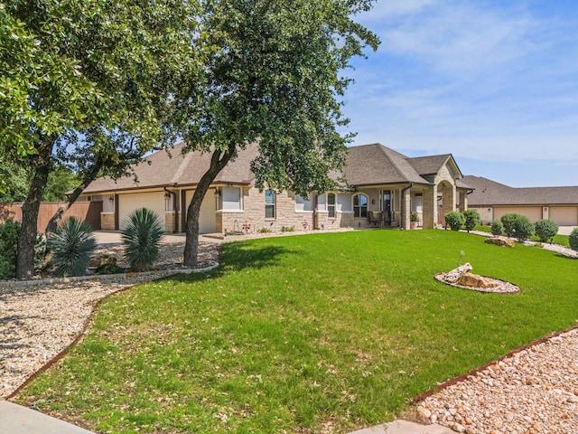 ranch-style home featuring a front lawn