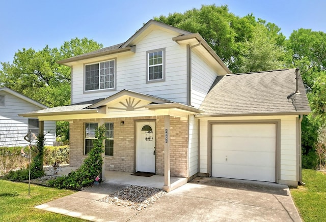 front of property featuring a garage